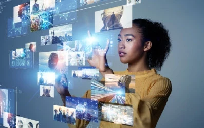 Three ways AI can automate customer support content woman selecting digital content from tiles