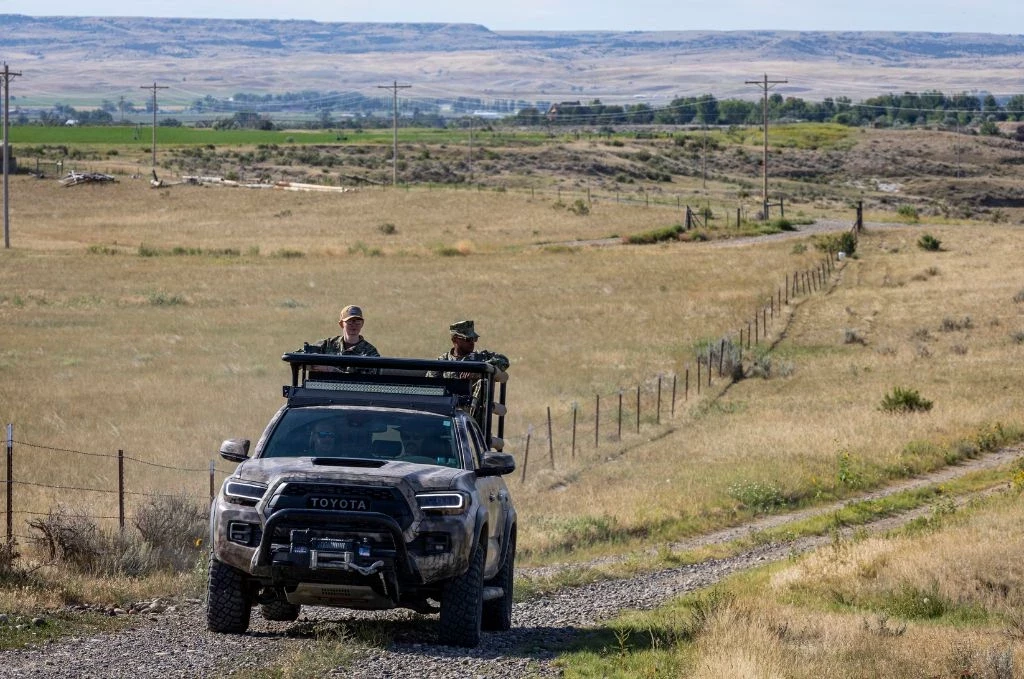Army Vehicle driving along road