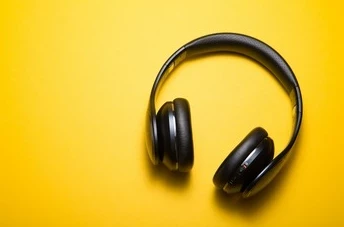 headphones on yellow background