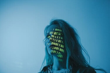 Woman with computer image on her face