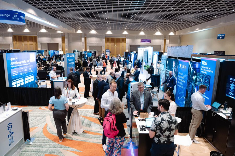 Busy SSOW expo floor with sponsors networking with attendees