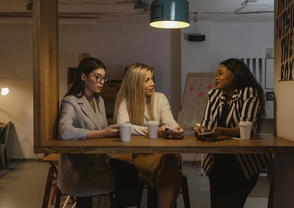 Female colleagues talking