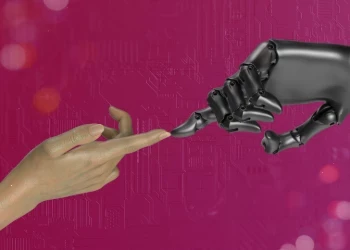Human and robot hand touching