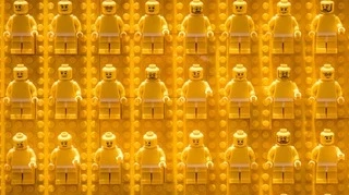 24 yellow lego people lined up