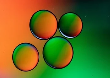 4 loops on orange and green background