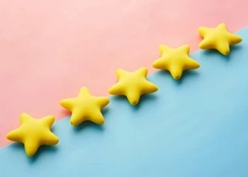 5 stars on blue and pink background
