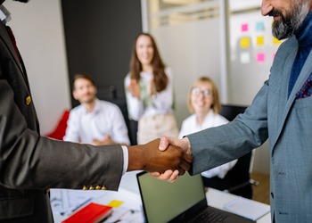 Business people shaking hands
