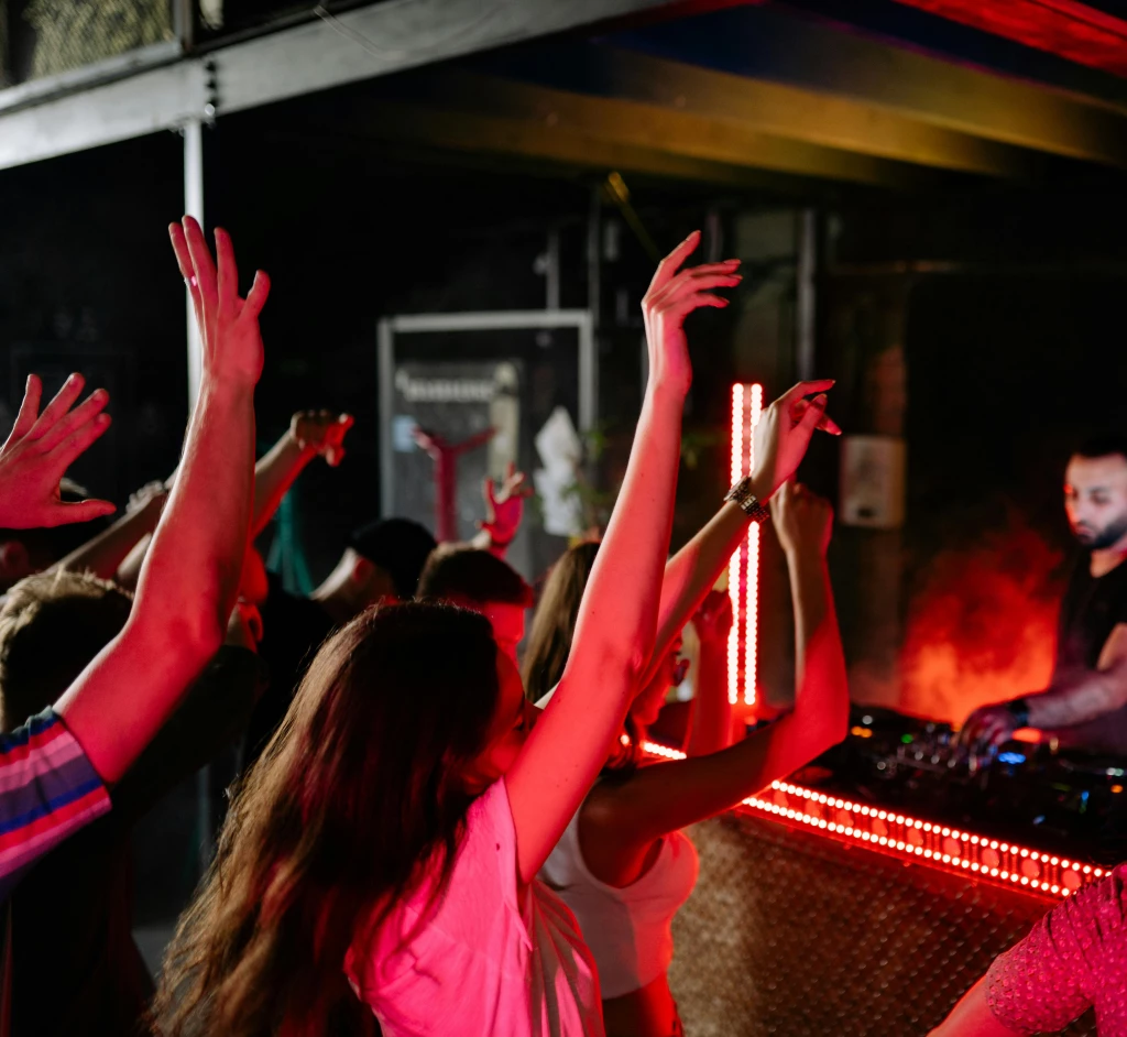 Club with DJ and lively crowd