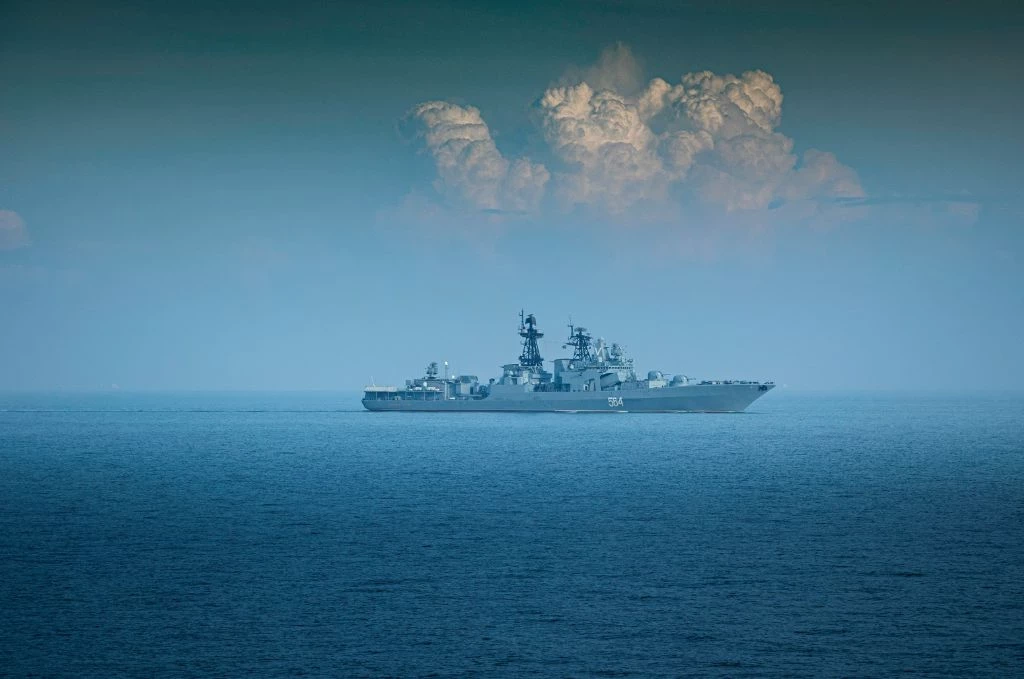 Photo of a naval ship on the ocean