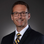 Bryan Hughes, Chief Sales Officer at First Bank