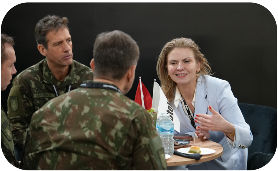 Delegates in a focused round-table discussion